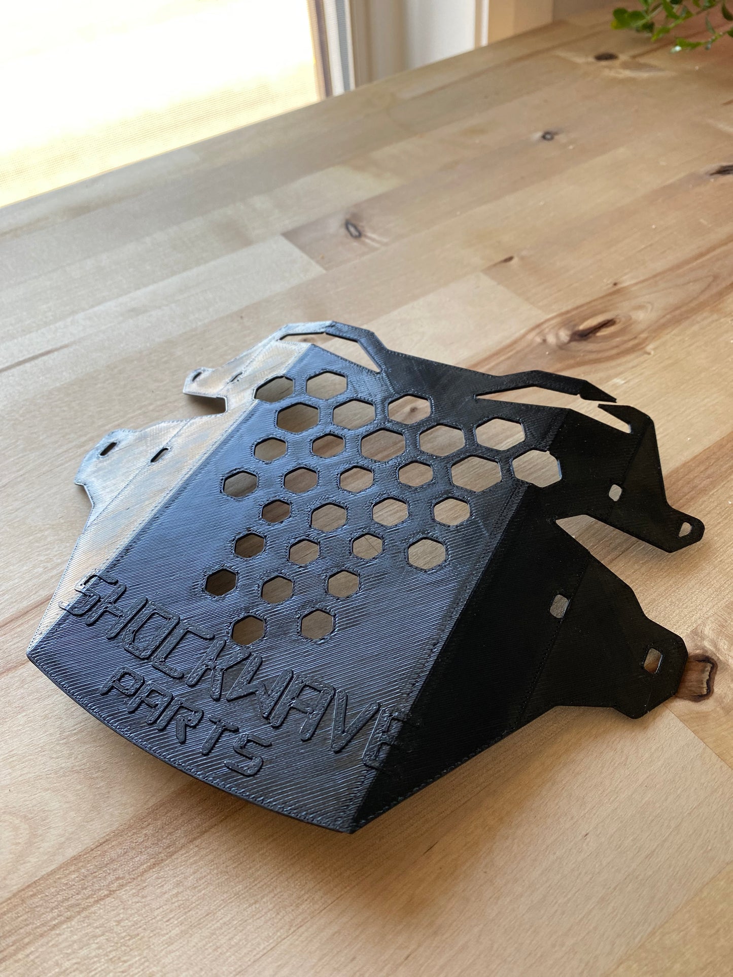 DH Name plate with honeycomb design.