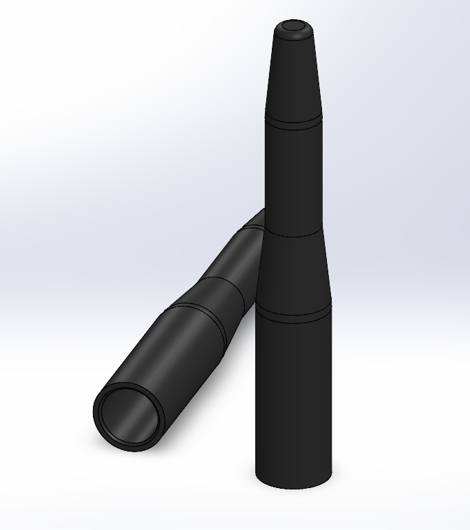 Two black cylindrical objects on a light gray background