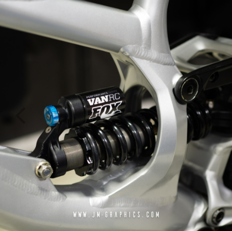 Close-up of a suspension fork with Van RC Fox branding on a mtb