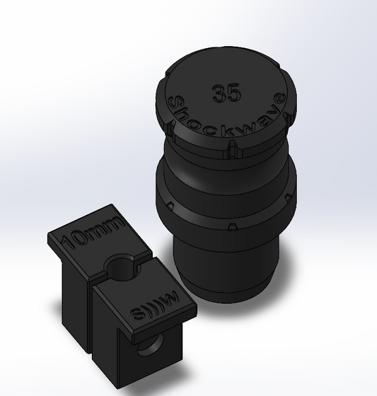 Stack of black cylindrical components with 'Shockwave' branding on a light gray background
